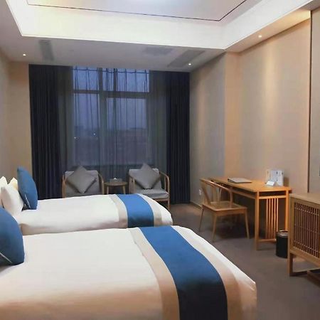 Feicheng Blossom Hotel Esterno foto