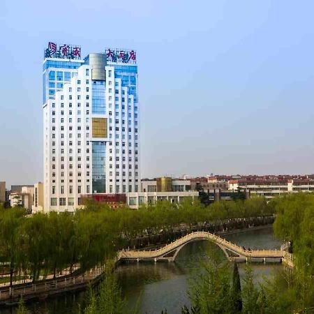 Feicheng Blossom Hotel Esterno foto