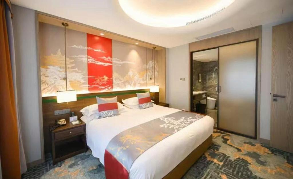 Feicheng Blossom Hotel Esterno foto