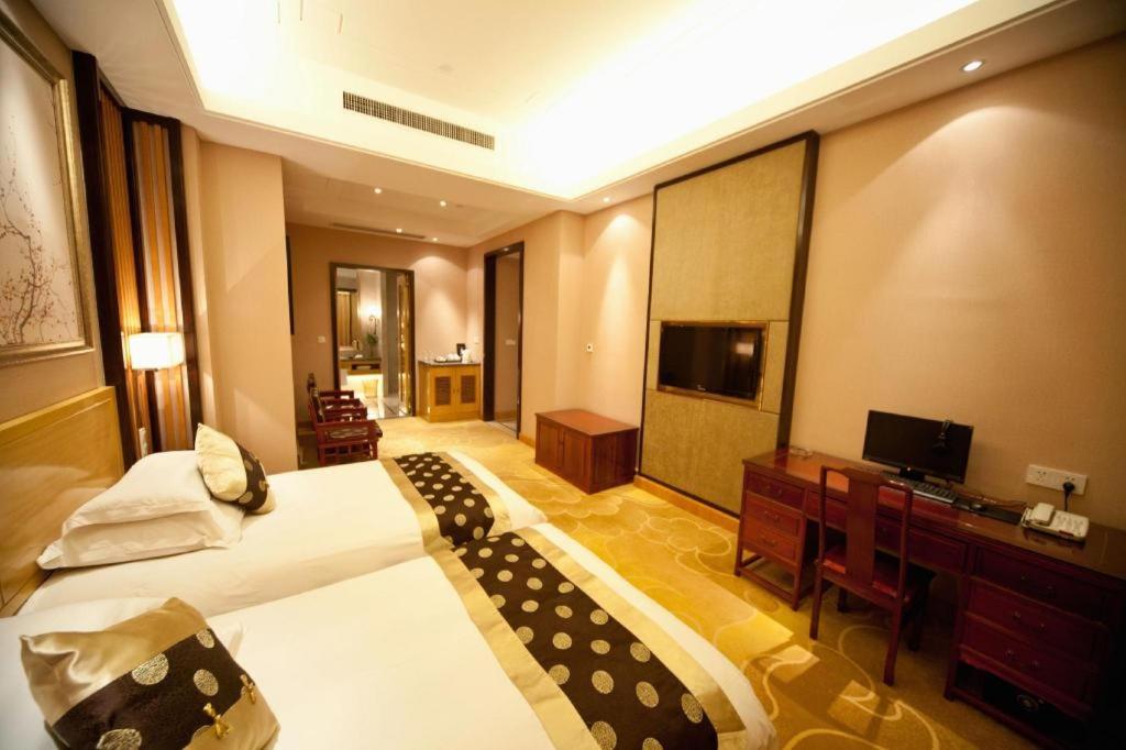 Feicheng Blossom Hotel Esterno foto