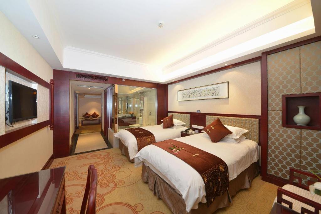 Feicheng Blossom Hotel Esterno foto