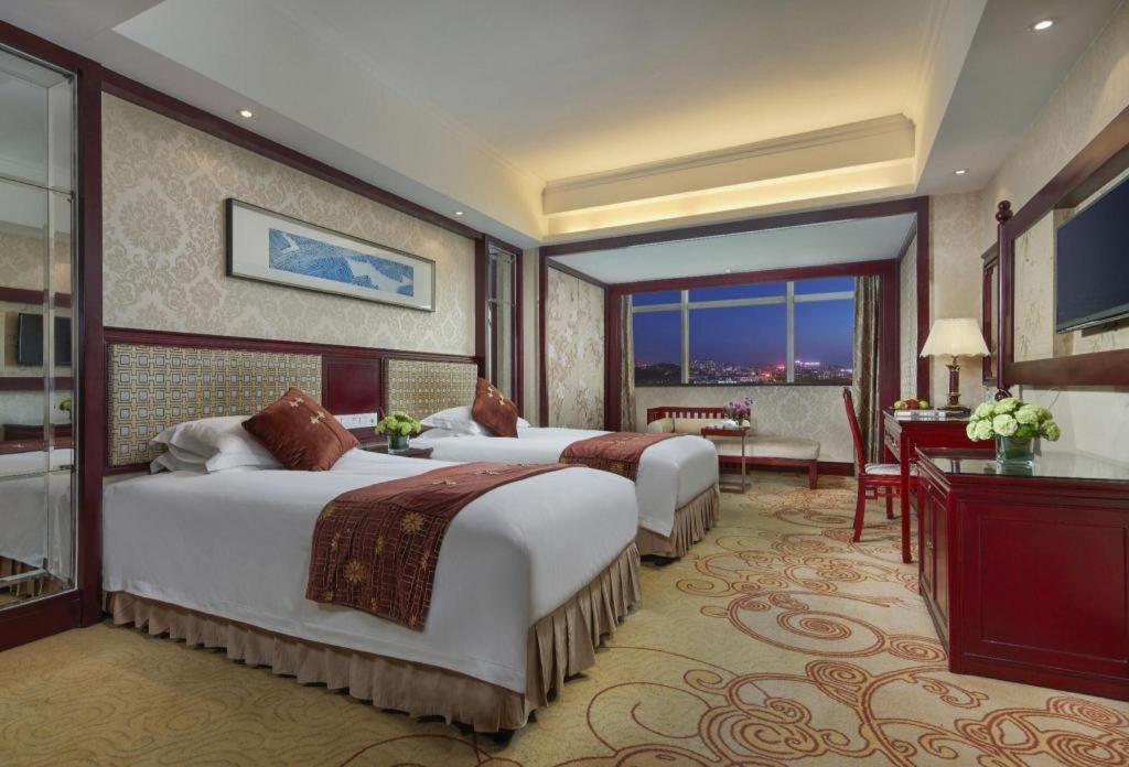 Feicheng Blossom Hotel Esterno foto