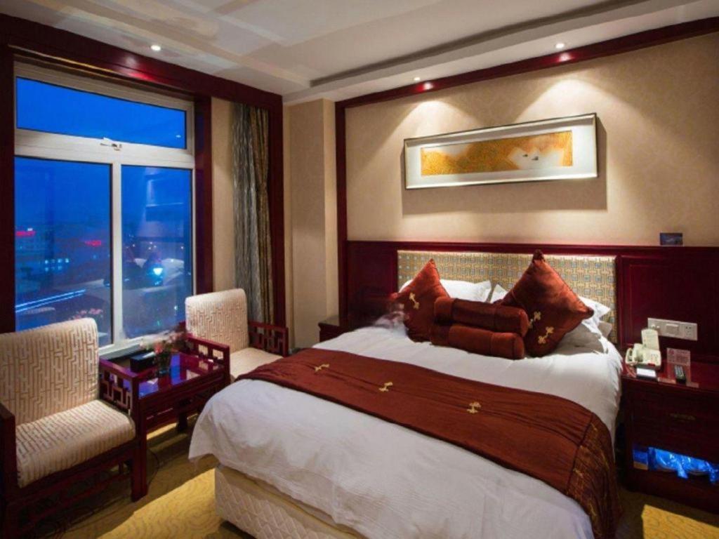 Feicheng Blossom Hotel Esterno foto