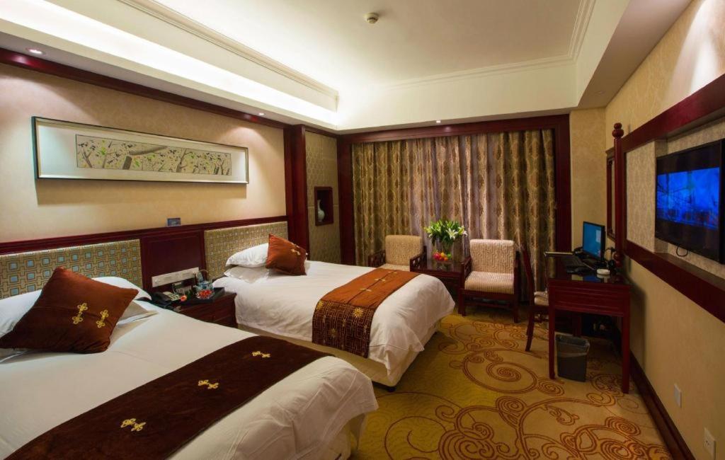 Feicheng Blossom Hotel Esterno foto