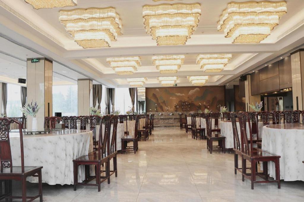 Feicheng Blossom Hotel Esterno foto