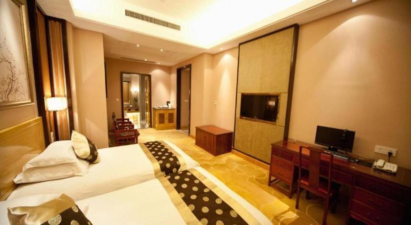 Feicheng Blossom Hotel Esterno foto
