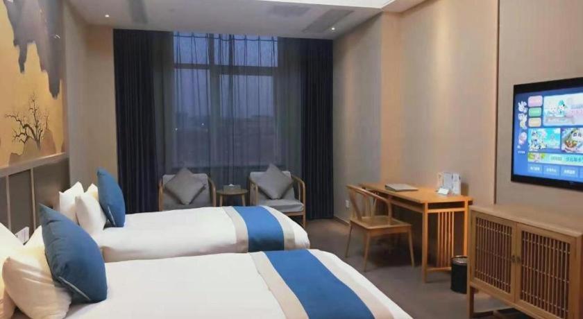 Feicheng Blossom Hotel Esterno foto