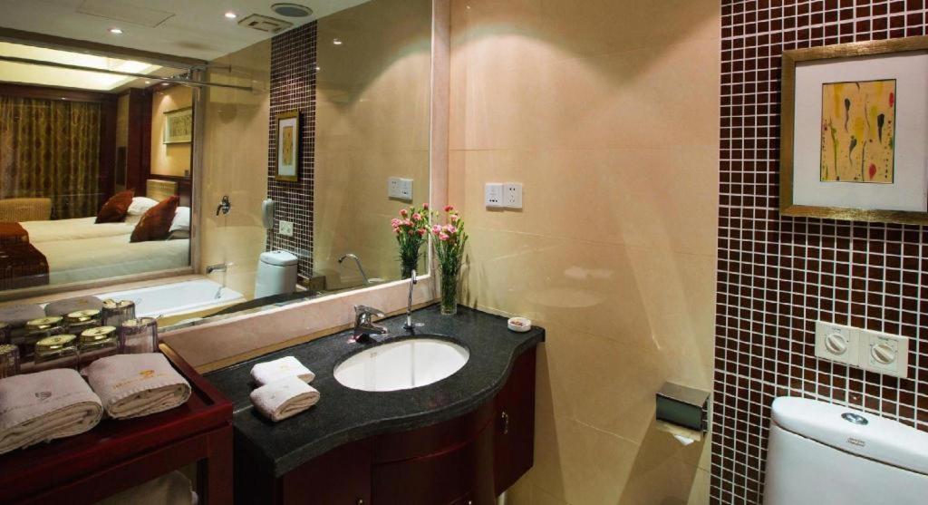 Feicheng Blossom Hotel Esterno foto