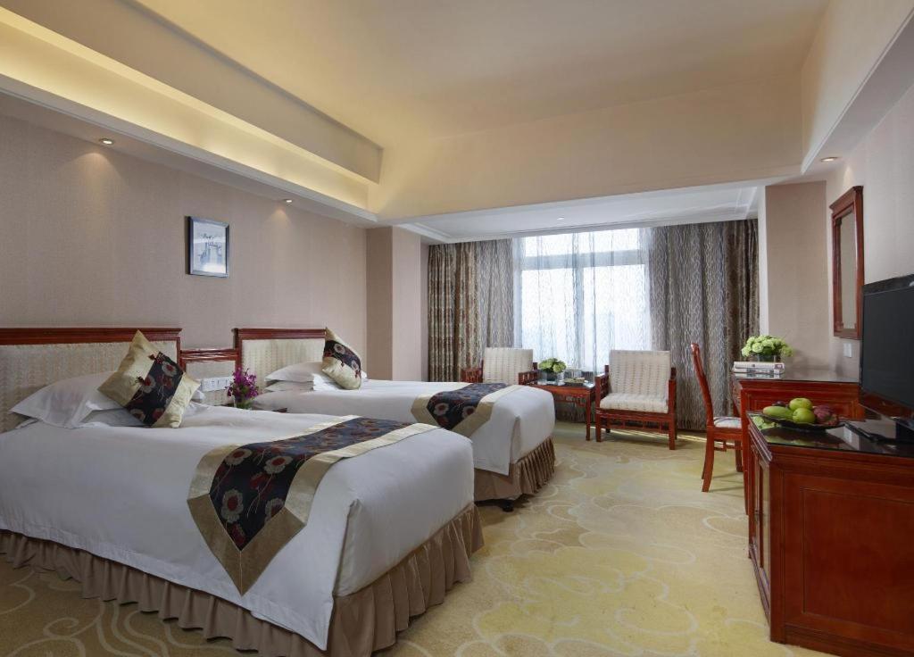 Feicheng Blossom Hotel Esterno foto
