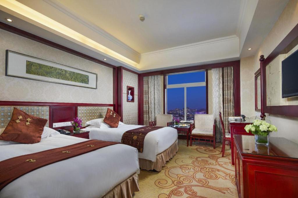 Feicheng Blossom Hotel Esterno foto