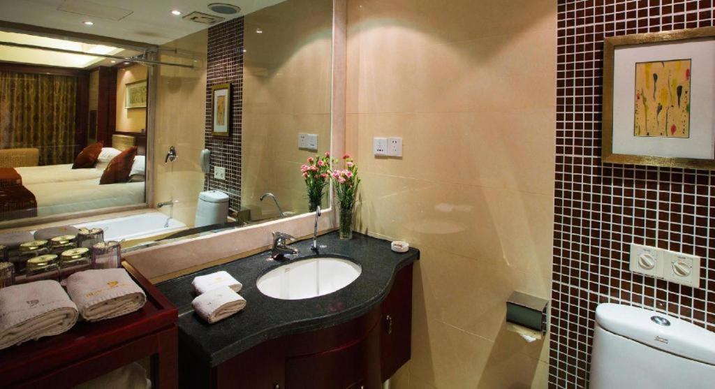 Feicheng Blossom Hotel Esterno foto